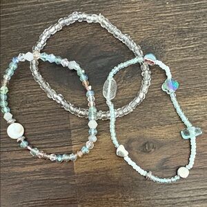 Hand Crafted Clear and Light Blue Beaded Bracelets